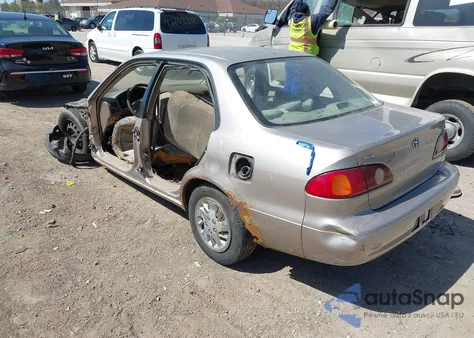 2001 Toyota Corolla Le z USA, uszkodzony, nr VIN 2T1BR18E01C472761